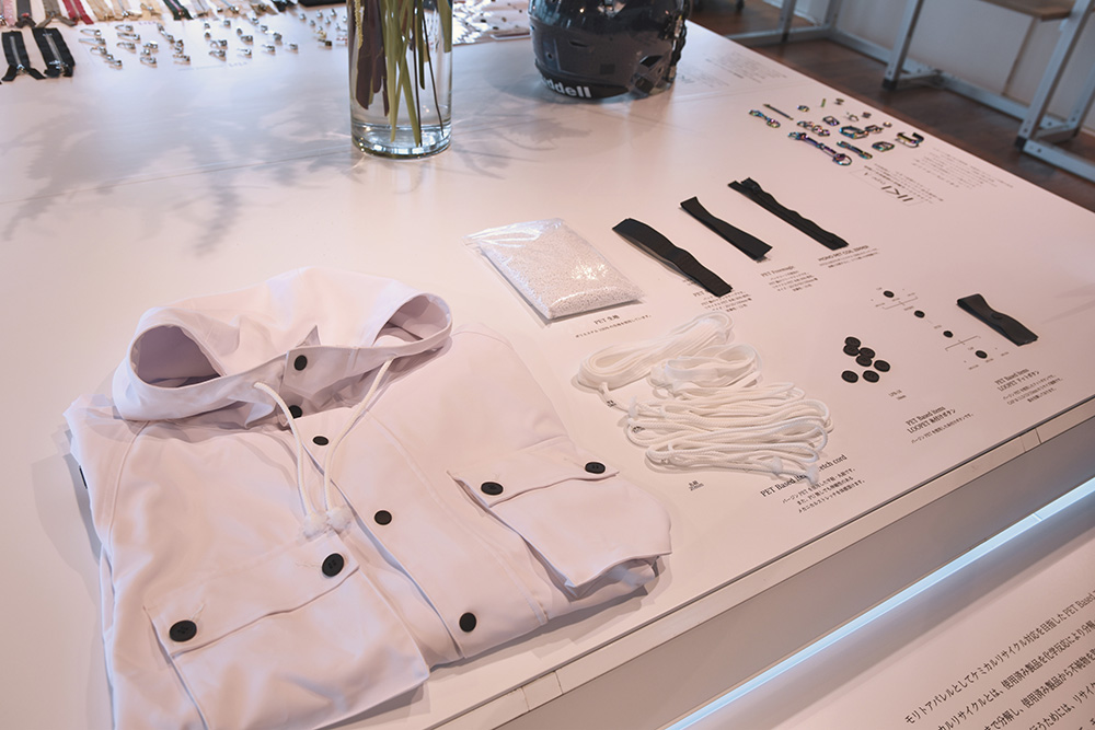 モリトアパレル、服のモノマテリアル化につながる再生PET副資材を開発